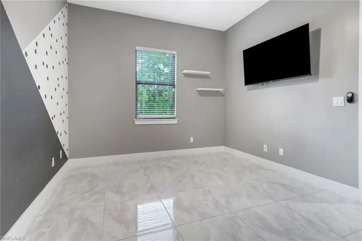 View of tiled spare room