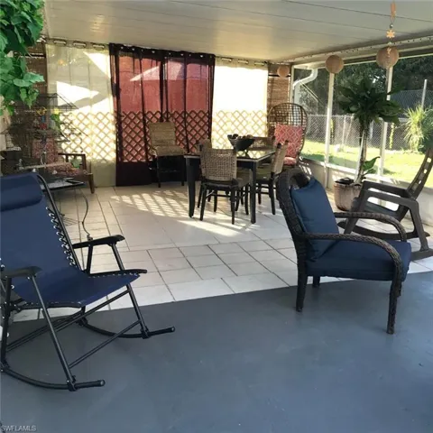 View of patio with outdoor dining space