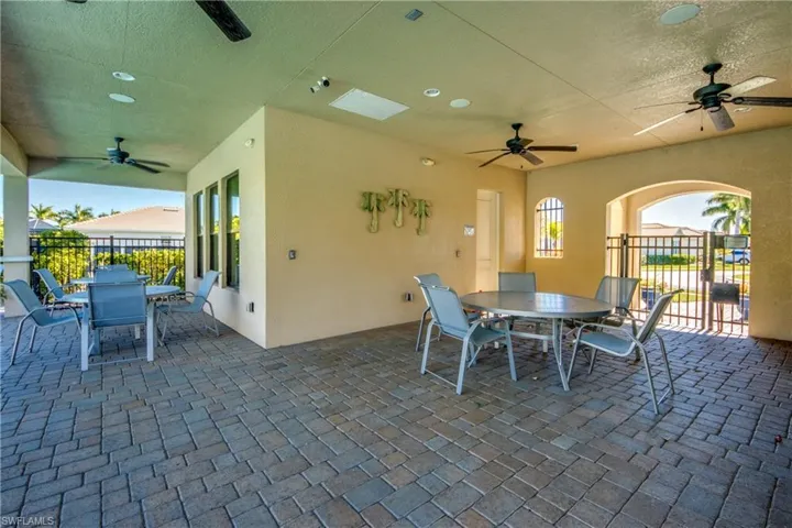 Covered outdoor patio with paver flooring