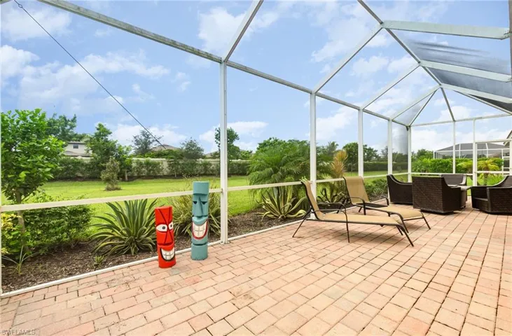 View of patio / terrace with a sunroom and a lanai