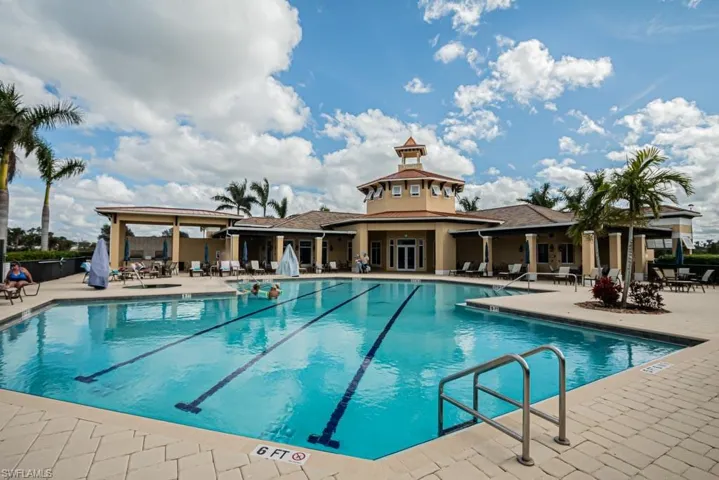 Community pool featuring a patio area