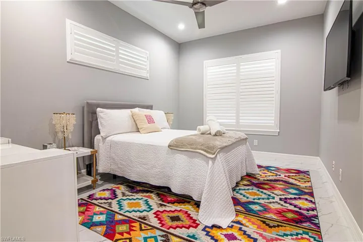 Bedroom featuring ceiling fan