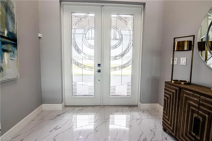 Doorway to outside featuring french doors