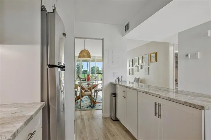 pass through to dining area    LVF floor through out  except bathrooms