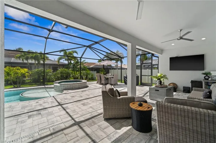Watch the game in the covered lanai seating area