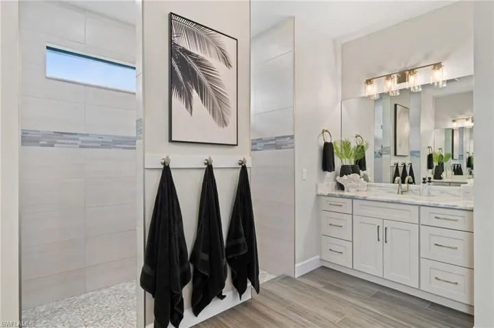 Oversized walk-around shower in the primary bath