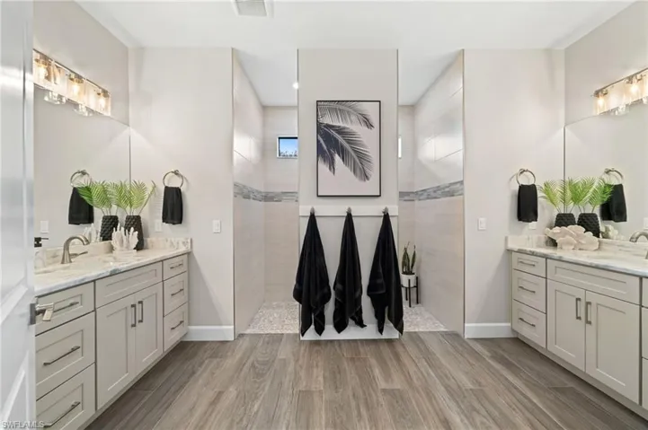 Dual vanities + upgraded finishes in primary bath