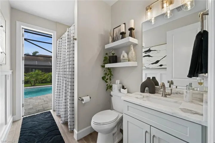 Guest bath with access to the lanai and pool