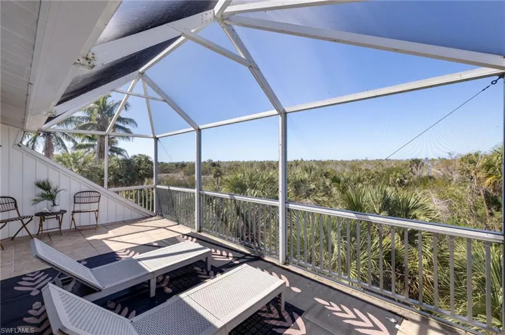 Primary Suite Lanai Overlooking Conservation Land----Sunsets Will NEVER Be Obstructed by Buildings!