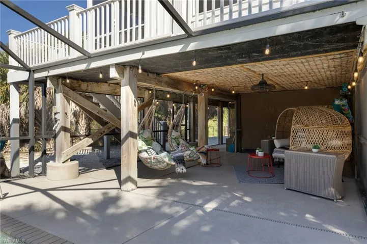 Screened and Covered Lounge Area Off the Pool Deck