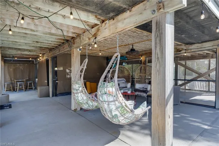 Covered, Screened Lounge Area off the Pool Deck