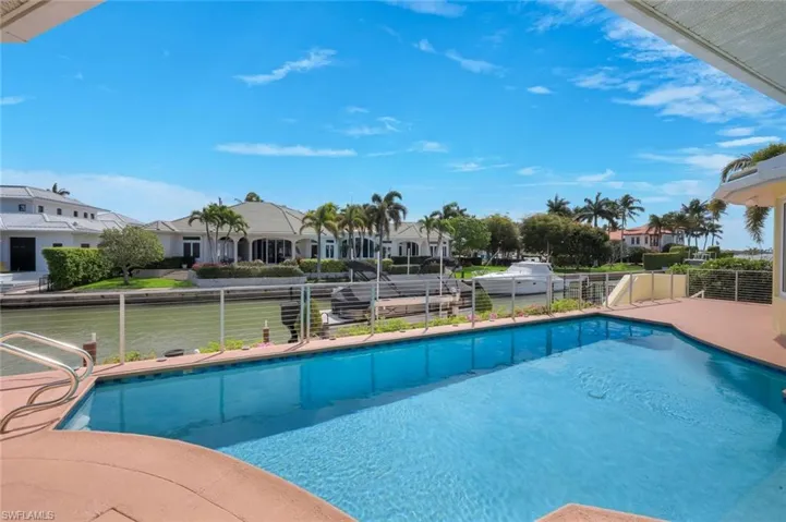 Swimming pool with a patio area