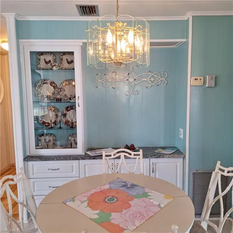 Dining space featuring an inviting chandelier
