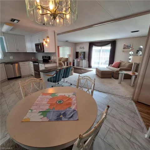 Dining area with a chandelier