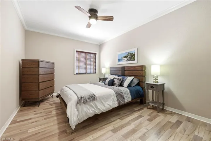 Guest bedroom with large closet, front of condo