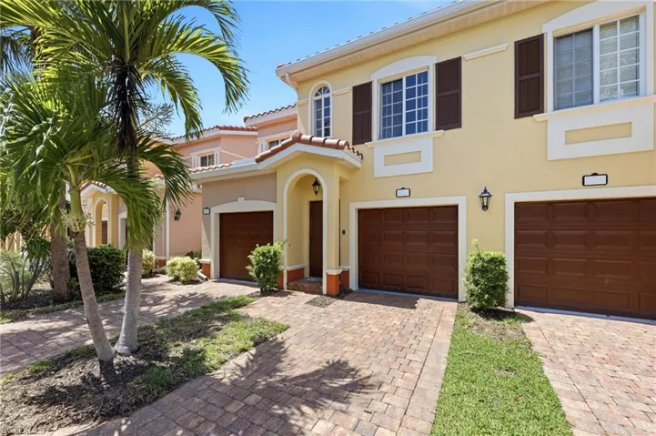 Angled view of entryway and driveway, garage