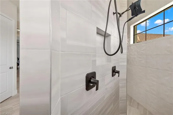 Bathroom with a tile shower