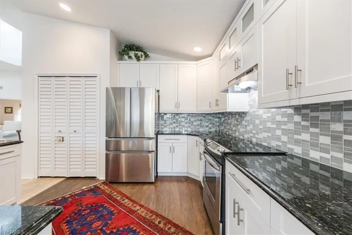 1367  Cypress Woods  DR, Naples, FL 34103