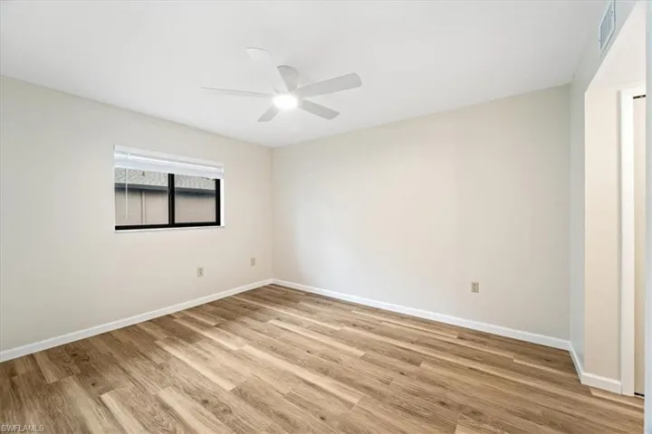 Unfurnished Bedroom room featuring light hardwood / wood-style floors and ceiling fan