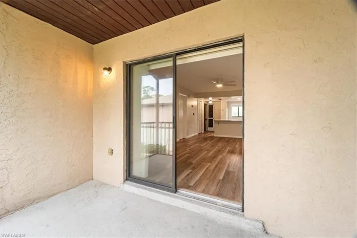View of exterior entry from the screened in Lanai
