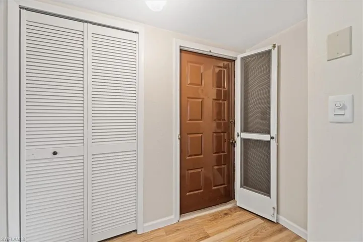 The main door and access to the laundry room
