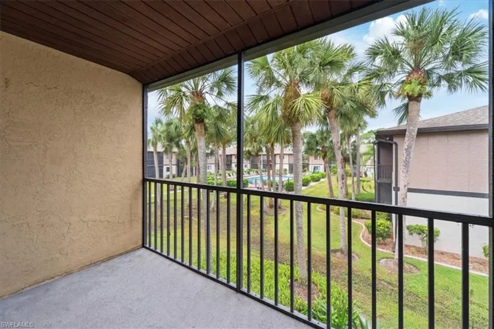 View of balcony with swimming pool views