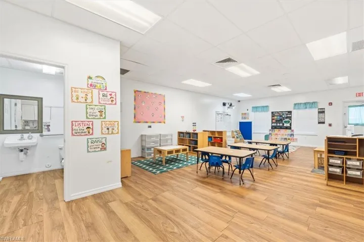 Game room with a drop ceiling