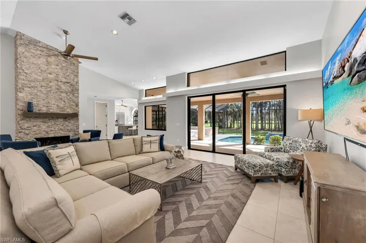 Living Room with wood-burning and gas fireplace