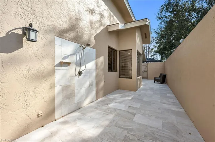 Private outdoor shower and sitting area, accessed from the Master Bedroom and the Den.