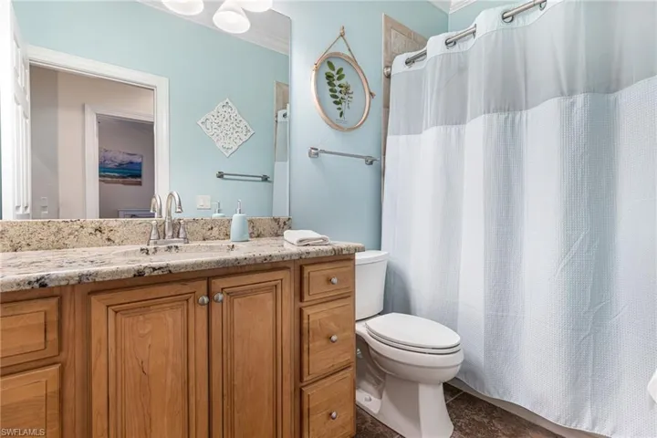 Guest Bathroom with shower and tub, granite on vanity