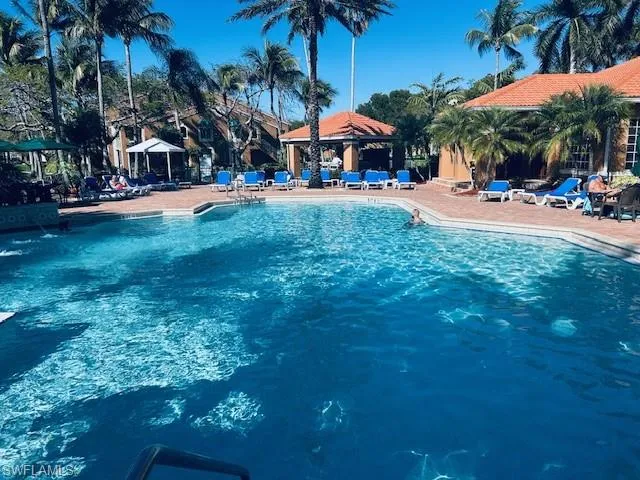 Community pool featuring a gazebo and a patio area