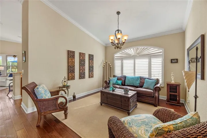 Living room has vaulted ceiling