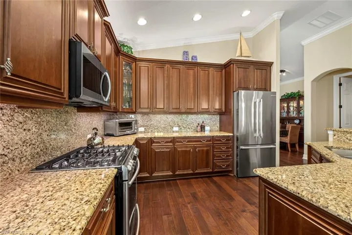 Upgraded wood cabinetry, upgraded stainless appliances
