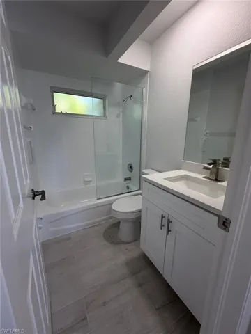 Full bath featuring vanity and bathtub / shower combination