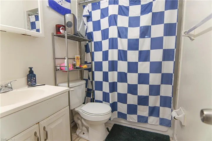 Bathroom featuring vanity and tile patterned floors
