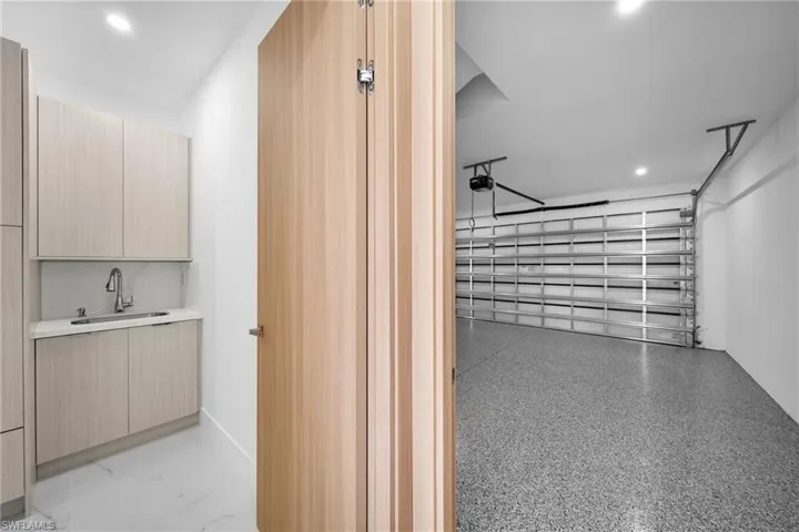 Garage featuring sink