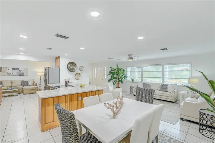 Tiled dining area with ceiling fan