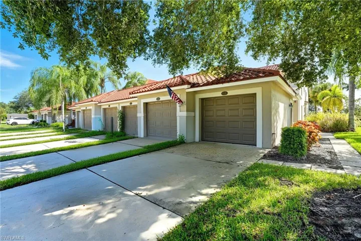 Garage featuring driveway