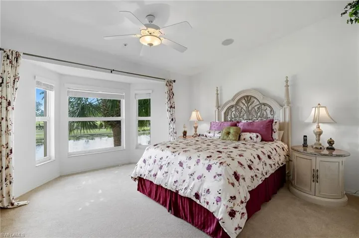 Bedroom featuring carpet and a ceiling fan