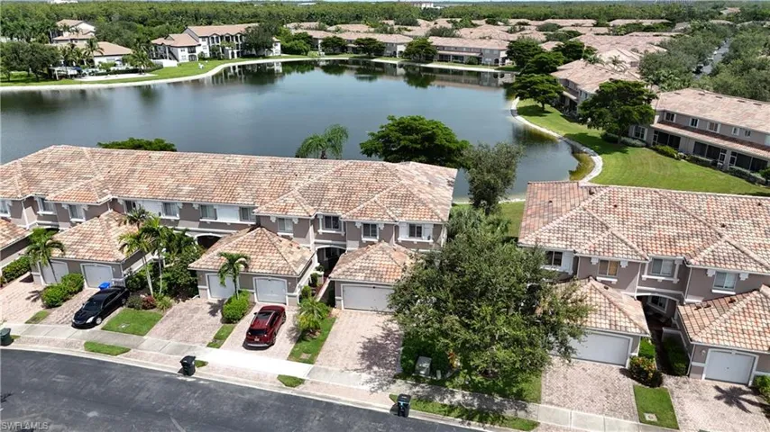 Aerial view of residential area with a large body of water