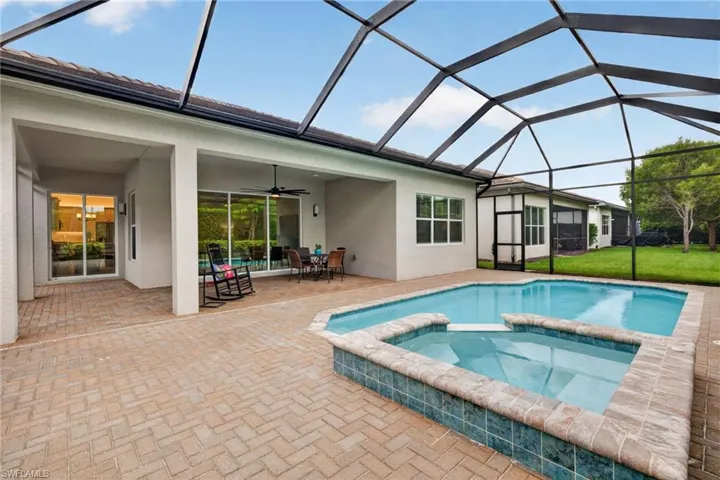 Attached hot tub adds even more fun to the pool experience! Enjoy!