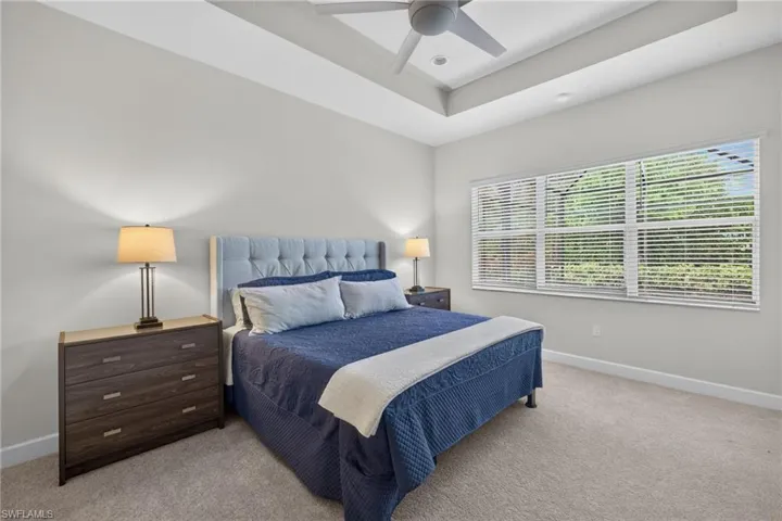 Recently replaced carpeting, 3 windows overlooking the pool area and space for any sized bedroom furniture AND a chair! 2 walk-in closets are present, too!