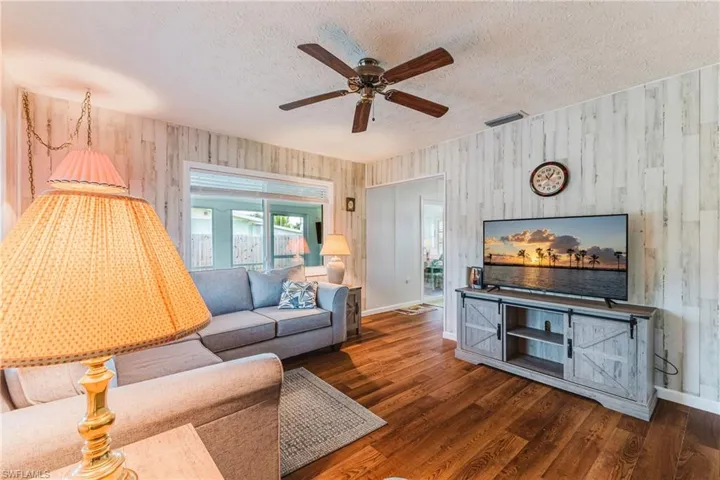 Wood-finish flooring throughout the space
