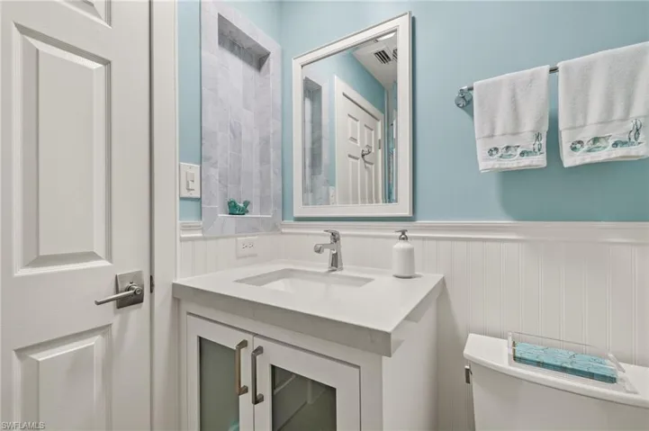 Bathroom with vanity and toilet