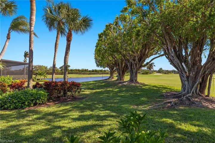 View of yard with a water view