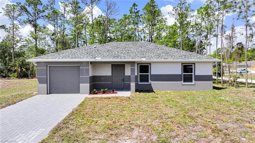 Amazing New Construction! This Brand New 3 Bedroom/2 Bathroom Home On An Oversized .29 Acre Lot With Old Growth Trees In The Greenbriar Neighborhood In Lehigh Acres!