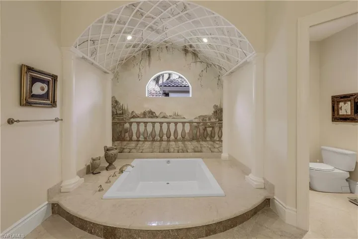 Relax while bathing in this oversized tub.