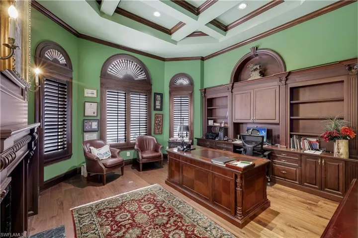 This stately office is tucked privately away from the main part of the home.