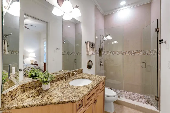 Convenient guest bath with upgraded shower enclosure