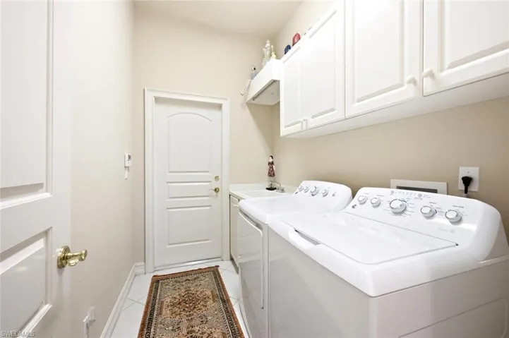 5872 Whisperwood Ct, Naples, Florida 34110